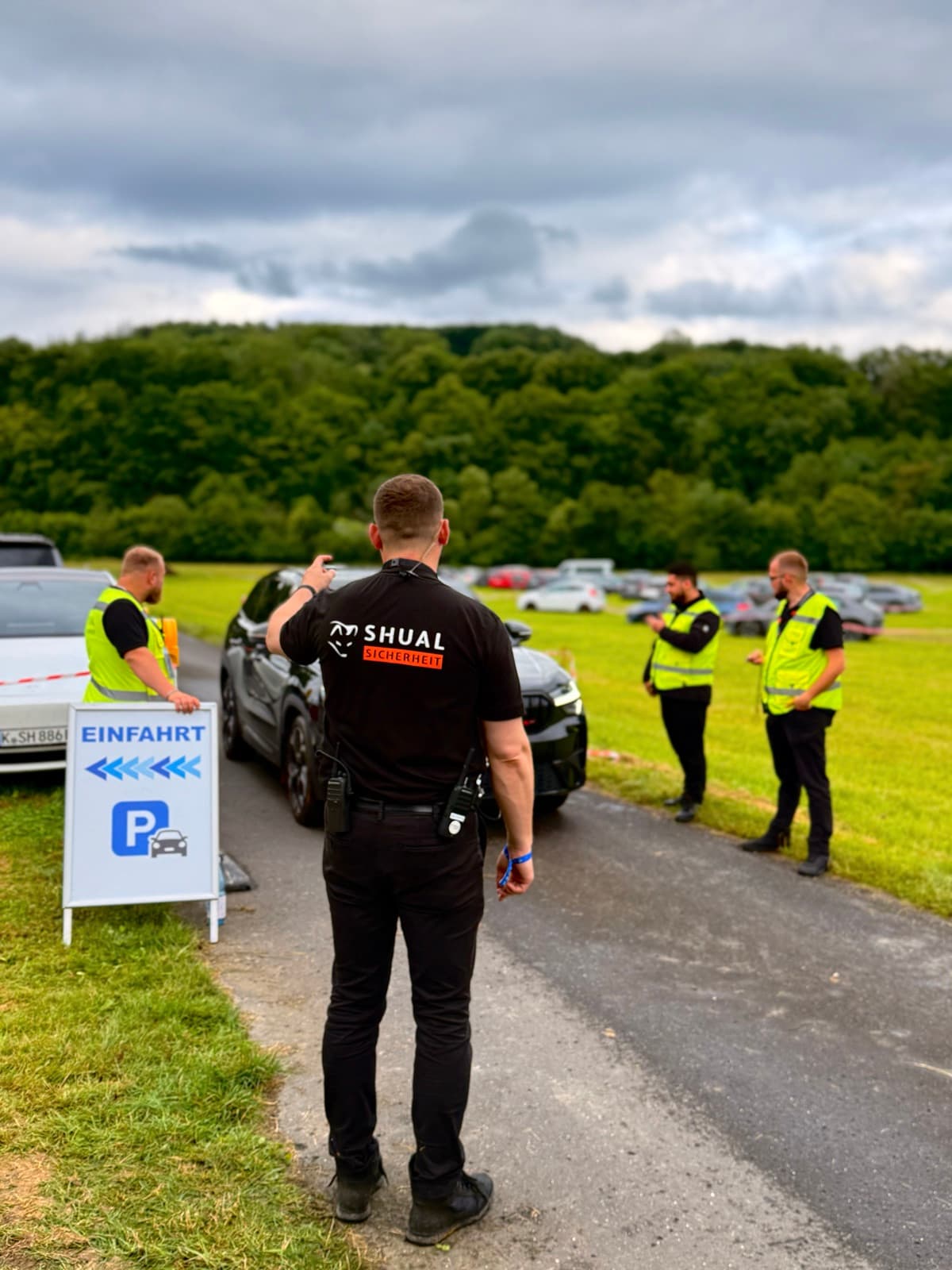 Shual Sicherheit staff managing vehicle access control at an event
